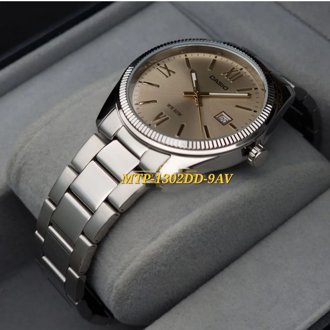 Casio – Montre classique fond doré pour hommes – Tout en acier inoxydable – Avec dateur – MTP-1302DD-9AV