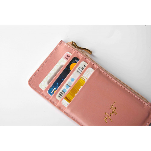 Portefeuille zippé rose
Portefeuille zippé rose