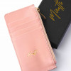 Portefeuille zippé rose