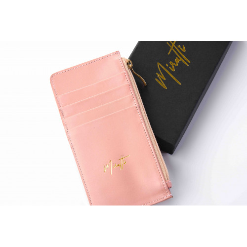 Portefeuille zippé rose
Portefeuille zippé rose