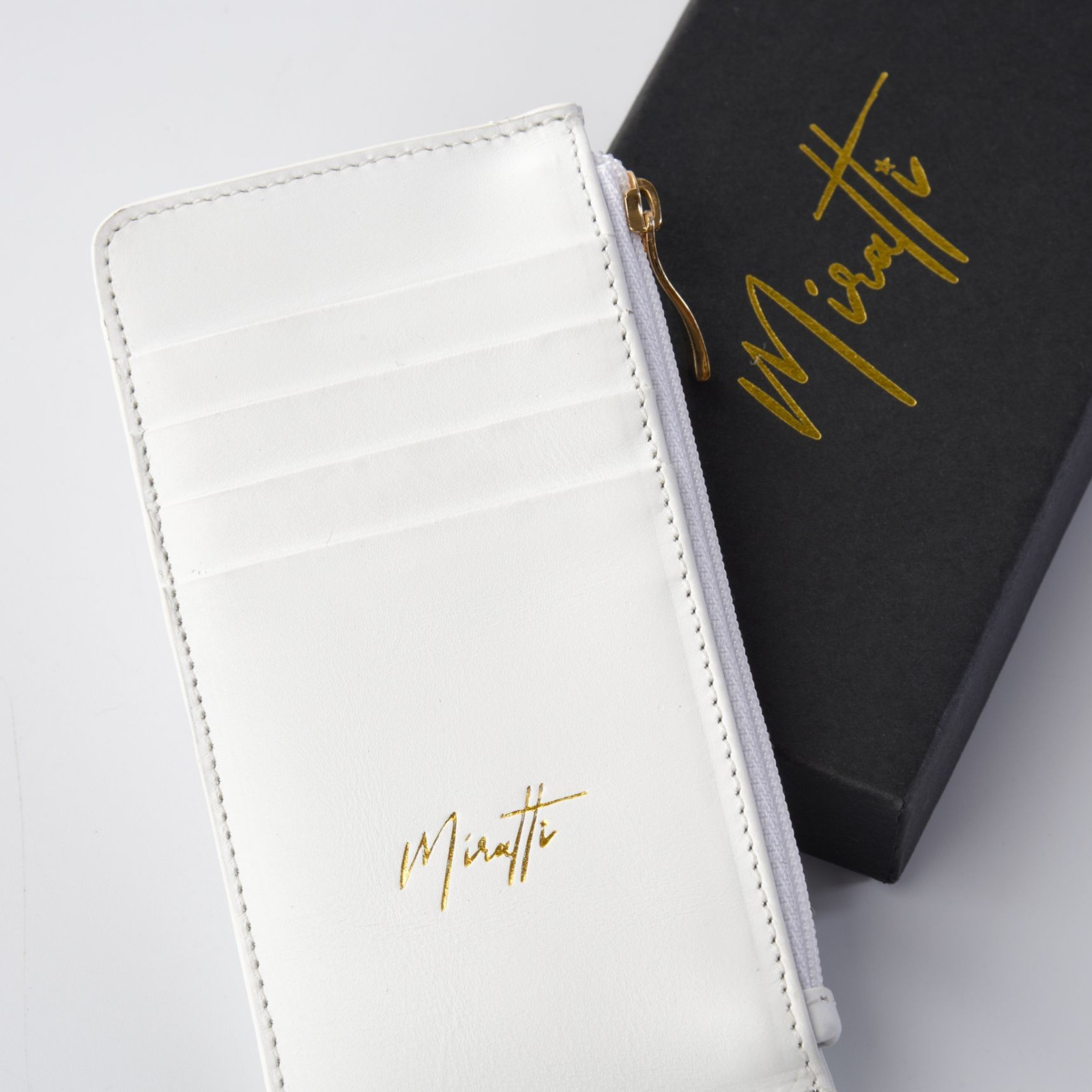 Portefeuille zippé blanc