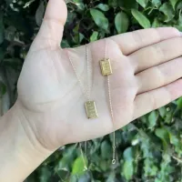 Collier et bracelet de 18 en forme de barre d’or